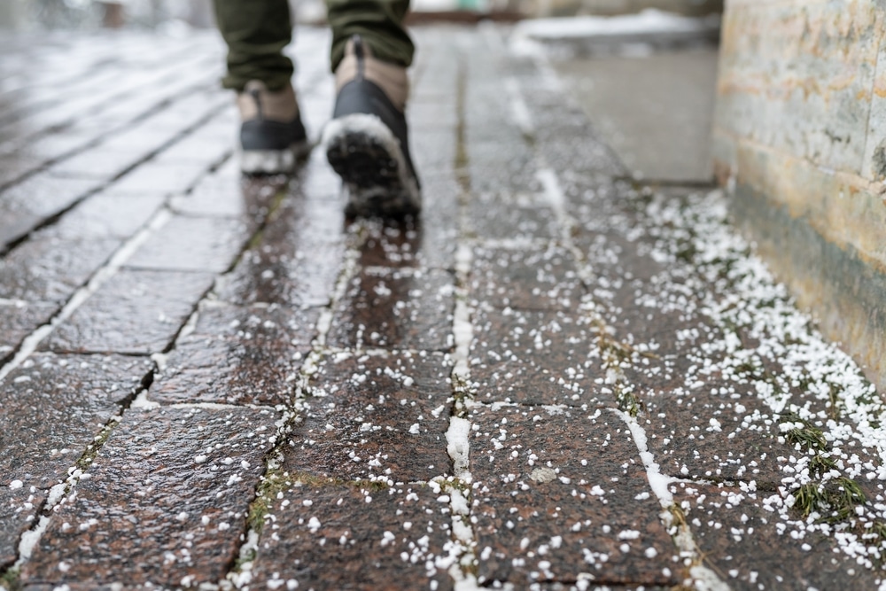 Road maintenance surface prepared for de-icing and ice control